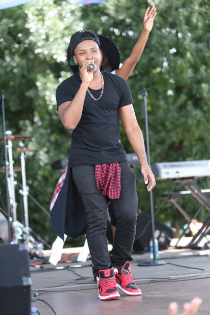 Livre Performs At Unity In The Community