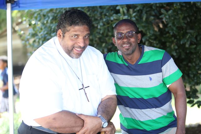 NAACP NC President Rev. William Barber and Michael Reese
