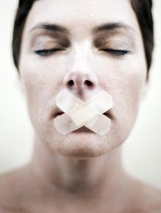 WOMAN SILENCED