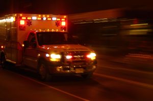 Ambulance at night, speeding