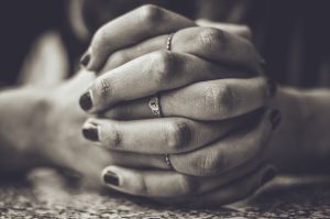 Close-Up Of Clasped Hands