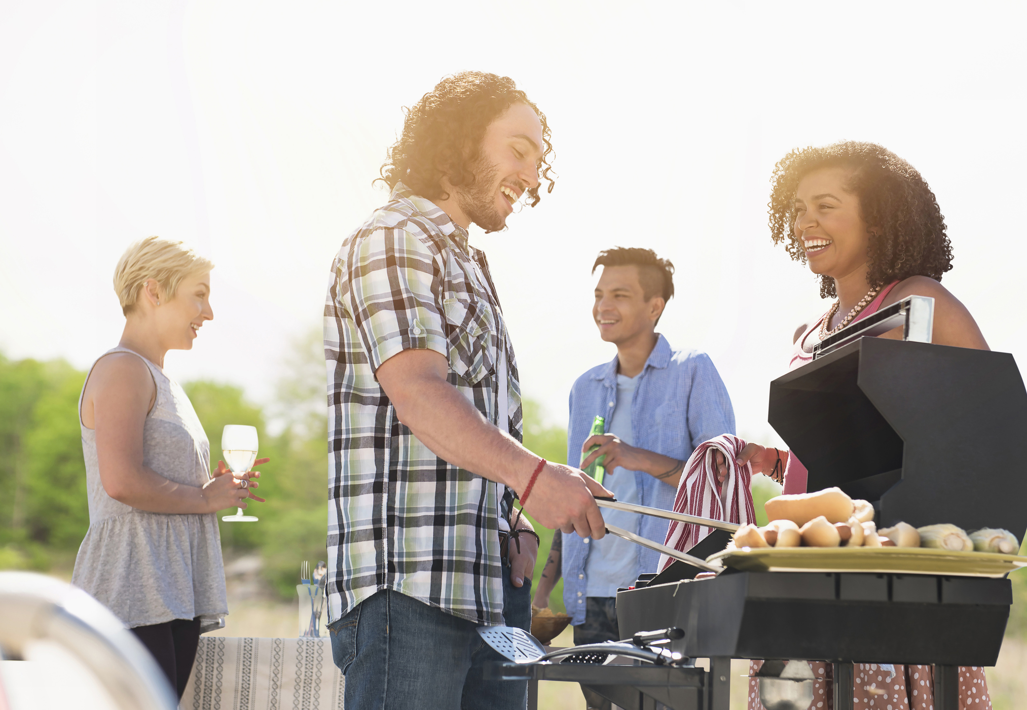 Friends talking at barbecue