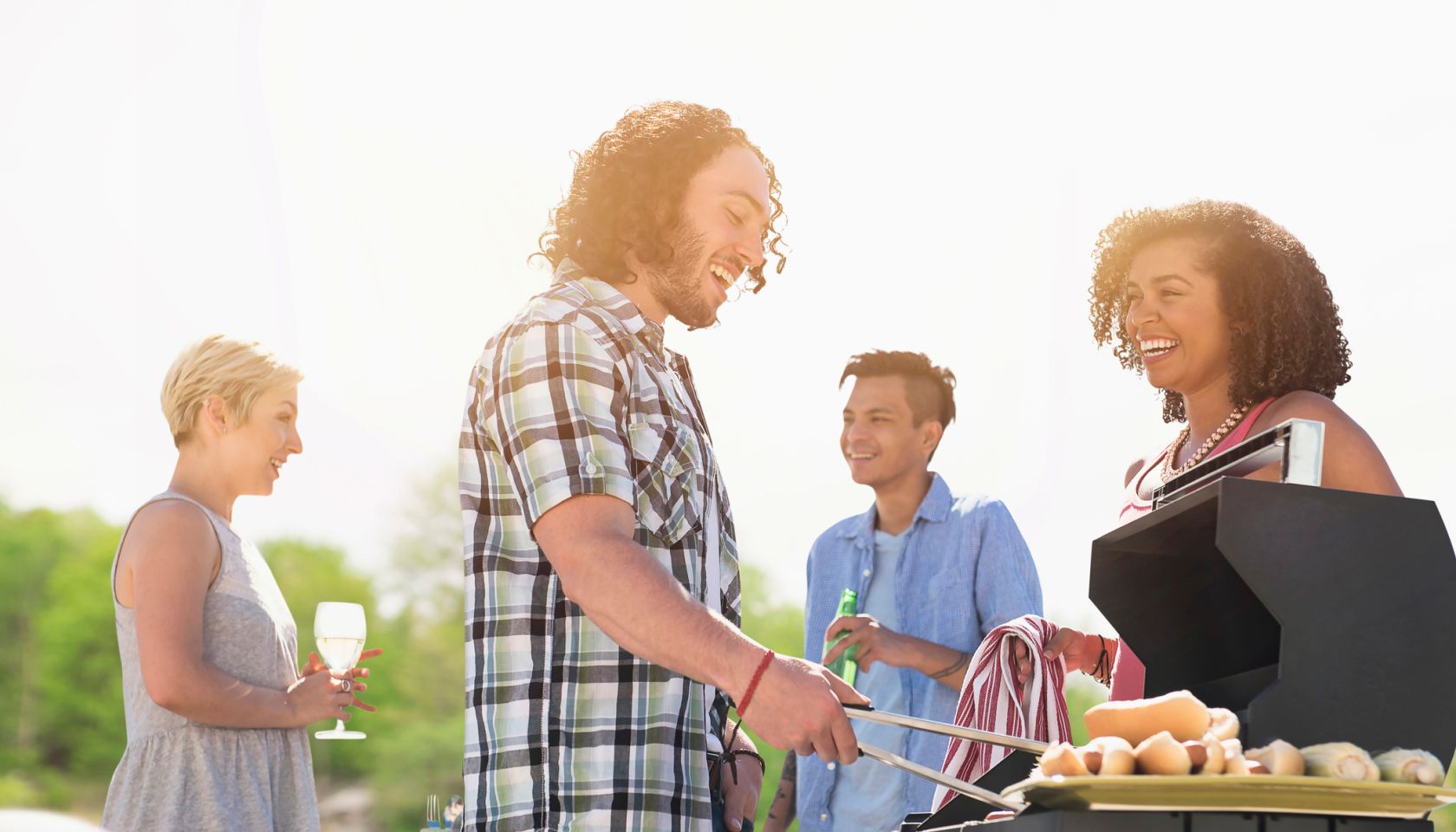 Friends talking at barbecue