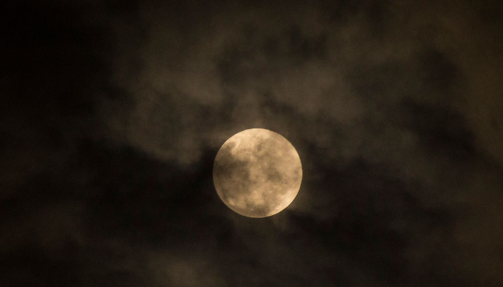 Penumbral lunar eclipse visible at night in Pekanbaru.This...