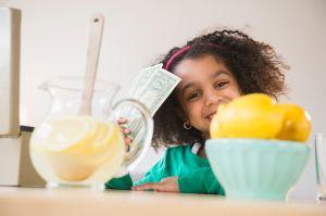 African American girl selling lemonade