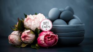 Dark toned Easter still life with peonies and hand painted ombre eggs