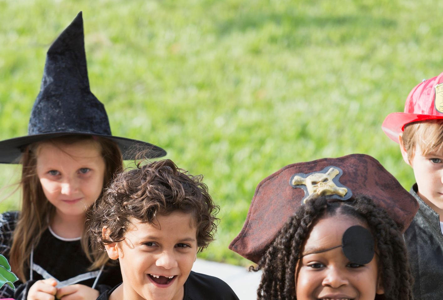 Multi-ethnic group of children in halloween costumes