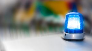 Blue light on police car, close-up