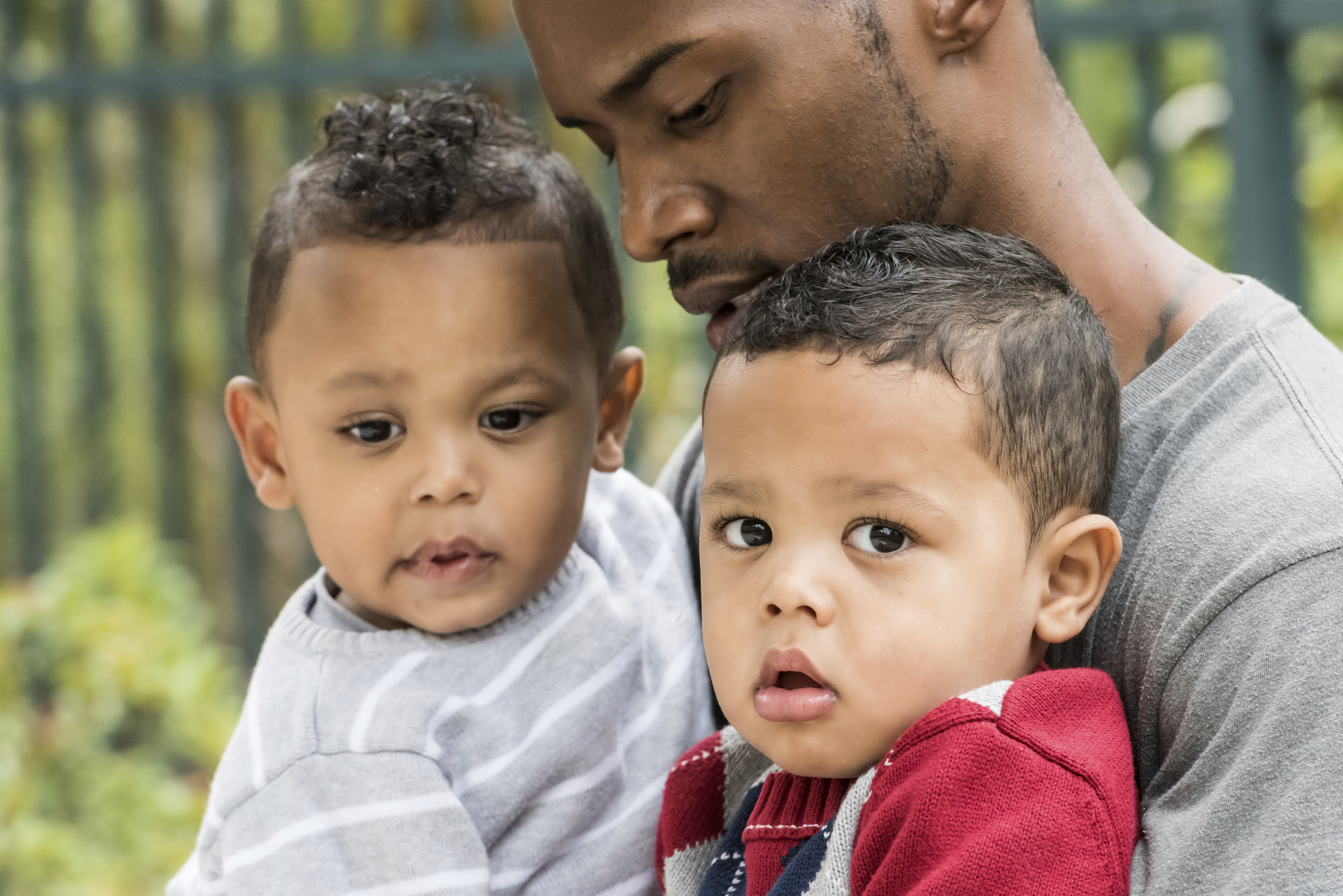 Little twins with their dad
