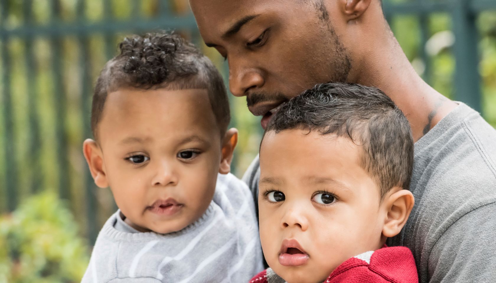 Little twins with their dad
