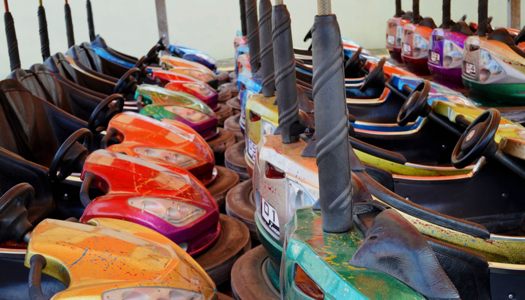 Colorful Bumper Cars At Amusement Park