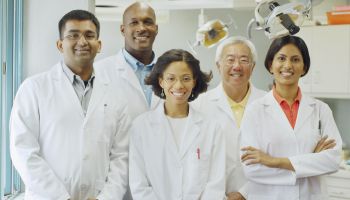 Group of dentists smiling