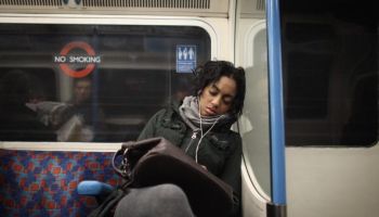 Woman sleeping on train