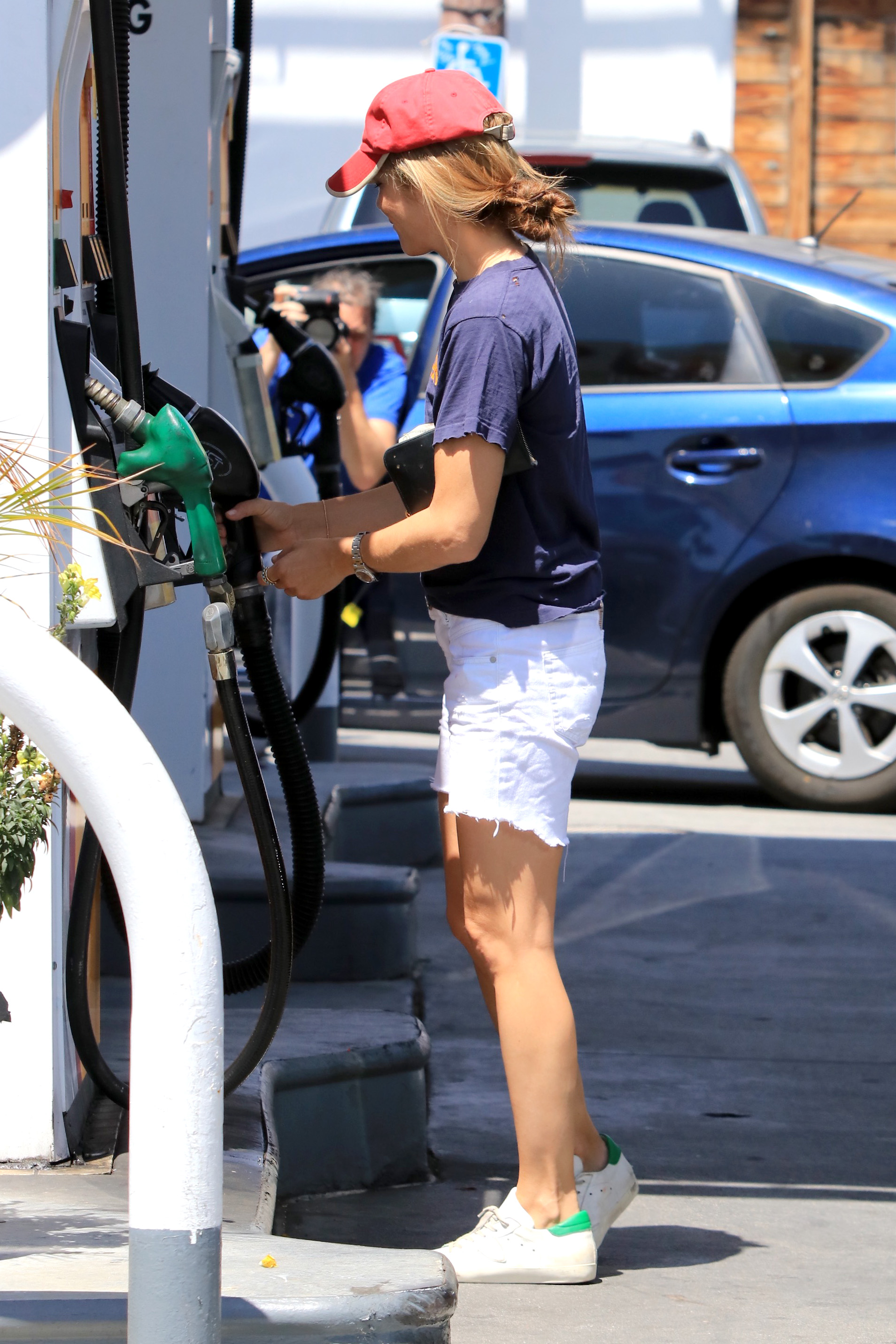 Selma Blair pumping gas