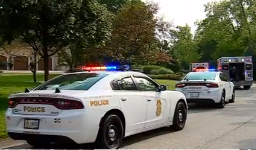 Police at Scene of Man in Water